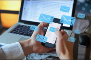 image of email icons with phone and laptop